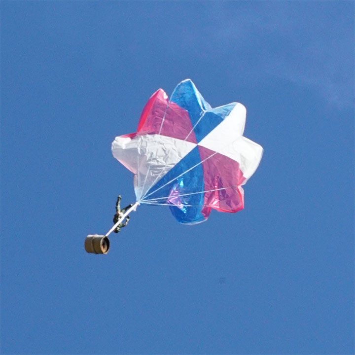 parachute in sky